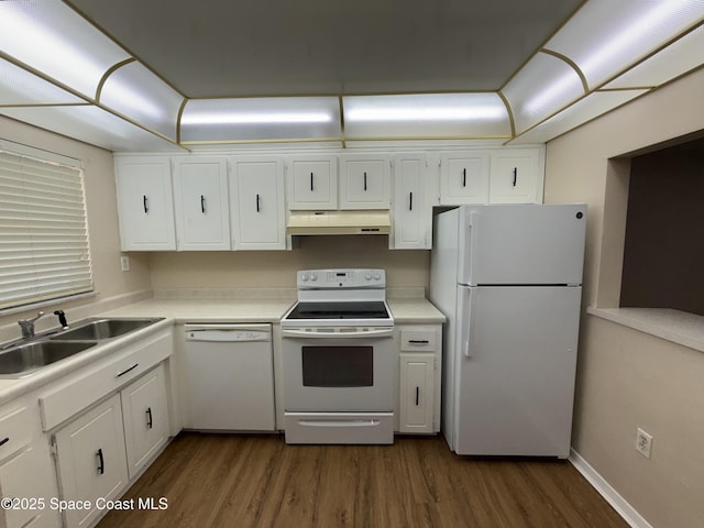 kitchen featuring white cabinetry, sink, dark wood-type flooring, and white appliances