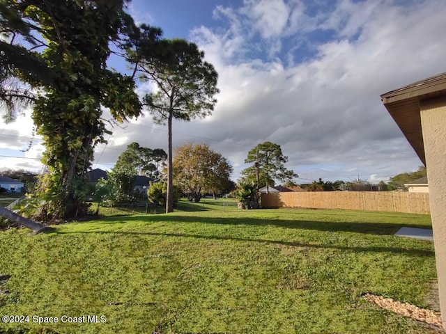 view of yard with fence