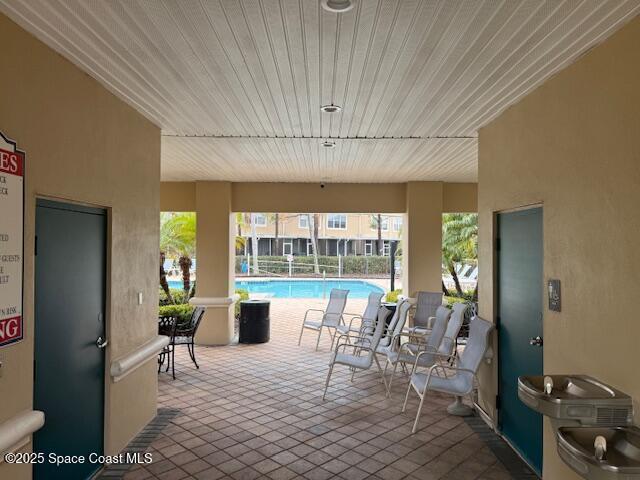 view of patio with a community pool