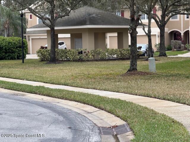 view of front of home with a front lawn