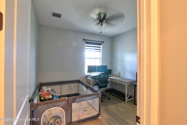 office area featuring hardwood / wood-style flooring and ceiling fan