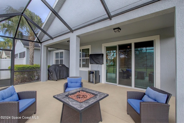 sunroom featuring vaulted ceiling