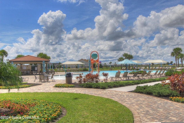 view of home's community featuring a gazebo and a pool