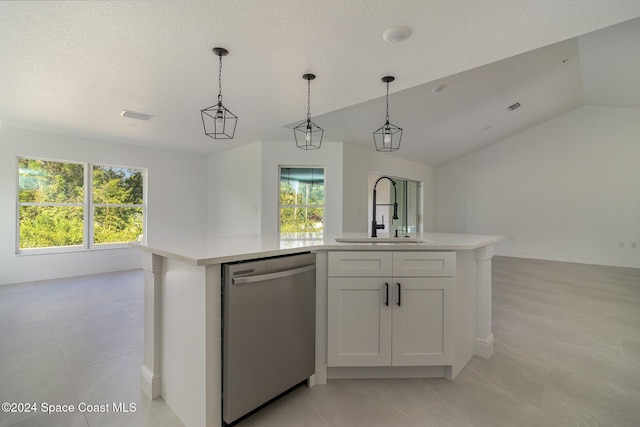 963 Sareta St SE, Palm Bay, FL 32909 - kitchen featuring stainless steel dishwasher, open floor plan, light countertops, and lofted ceiling