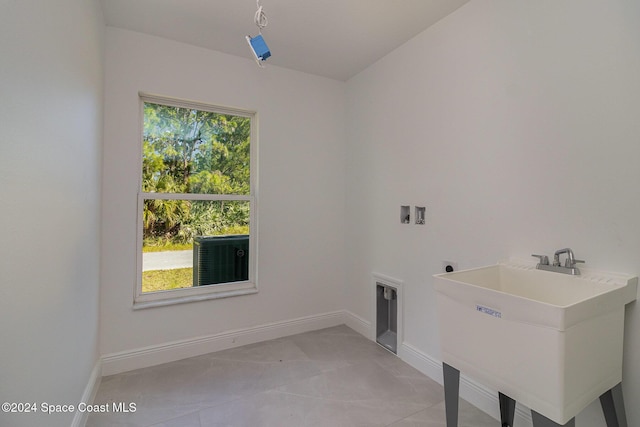 963 Sareta St SE, Palm Bay, FL 32909 - laundry area featuring washer hookup and hookup for an electric dryer