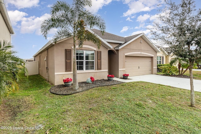 ranch-style house featuring a garage and a front lawn