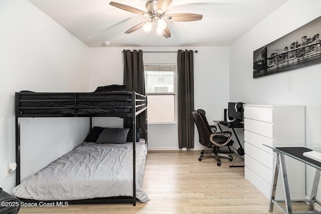 bedroom featuring ceiling fan and light hardwood / wood-style floors