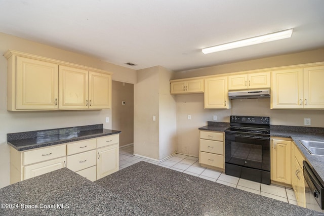 kitchen with dishwasher, light tile patterned flooring, sink, and black range with electric cooktop