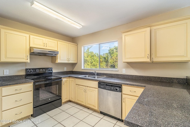 kitchen featuring electric range, dishwasher, light tile patterned floors, and sink