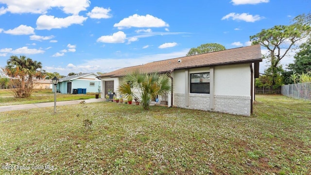 ranch-style house with a front lawn