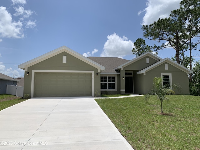 698 De Groodt Rd SW, Palm Bay, FL 32908 - ranch-style home with stucco siding, an attached garage, driveway, and a front yard