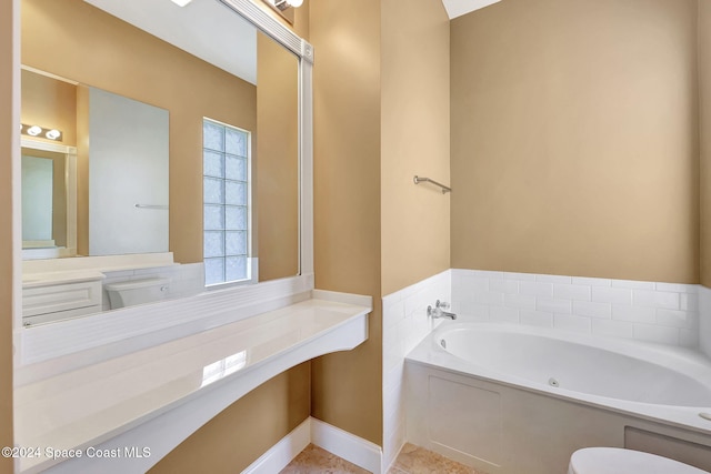 bathroom featuring a tub to relax in