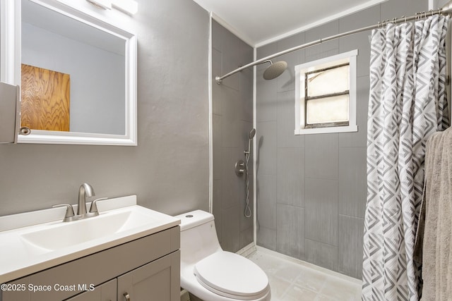 bathroom featuring vanity, toilet, and a shower with shower curtain