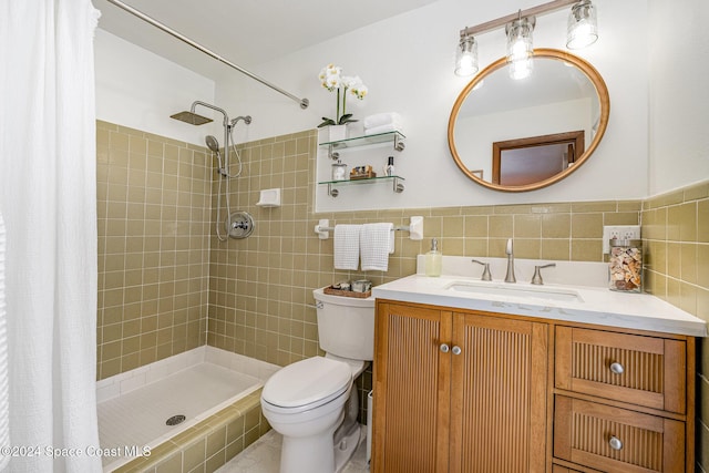 bathroom featuring a shower with shower curtain, vanity, and toilet