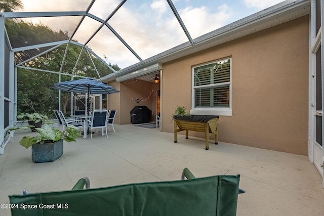 patio terrace at dusk with a lanai