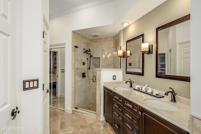 bathroom with crown molding, a shower with door, and vanity