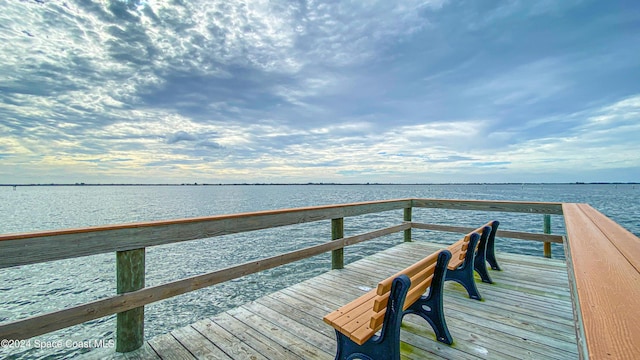 dock area featuring a water view