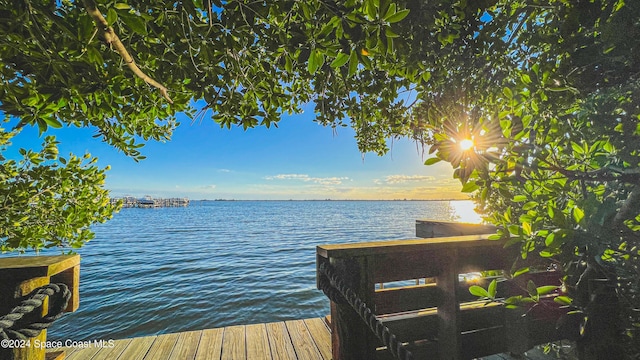 view of dock with a water view