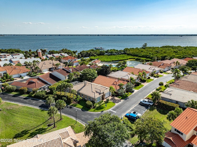 5601 Sea Lavender Pl, Melbourne Beach, FL 32951 - aerial perspective of suburban area with a large body of water