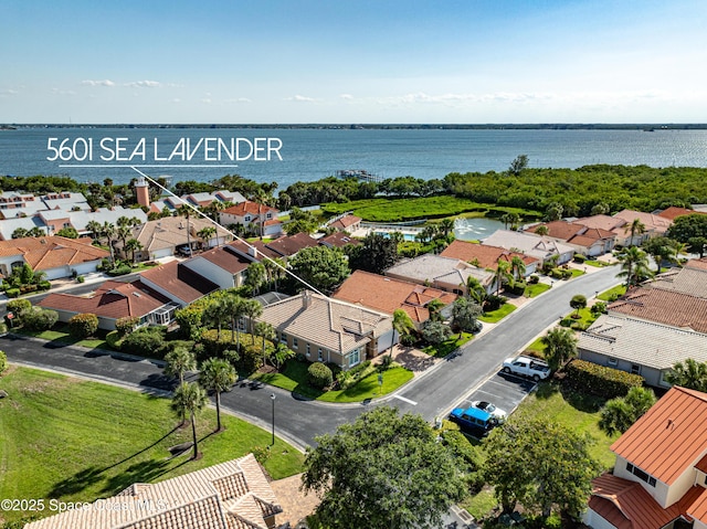 5601 Sea Lavender Pl, Melbourne Beach, FL 32951 - aerial perspective of suburban area with a nearby body of water
