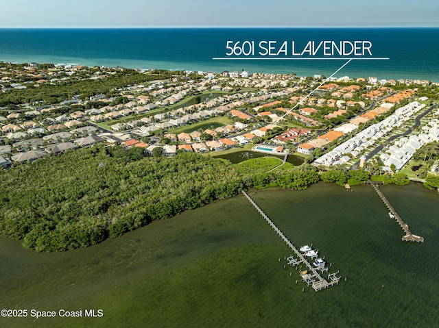 5601 Sea Lavender Pl, Melbourne Beach, FL 32951 - aerial overview of property's location featuring nearby suburban area and a large body of water