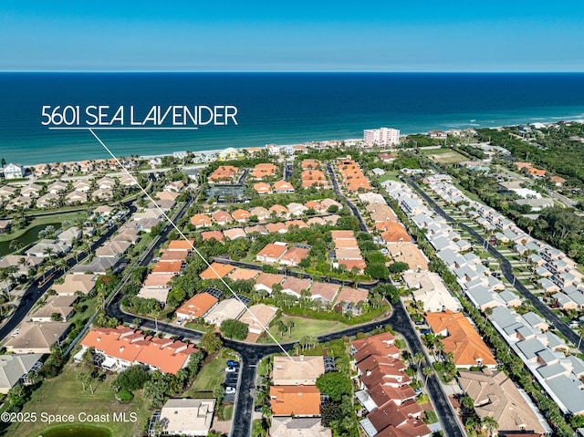 5601 Sea Lavender Pl, Melbourne Beach, FL 32951 - aerial view of property and surrounding area featuring nearby suburban area and a nearby body of water