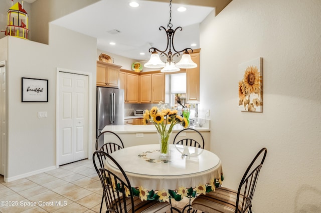 5601 Sea Lavender Pl, Melbourne Beach, FL 32951 - dining room with recessed lighting, a chandelier, light tile patterned floors, and baseboards