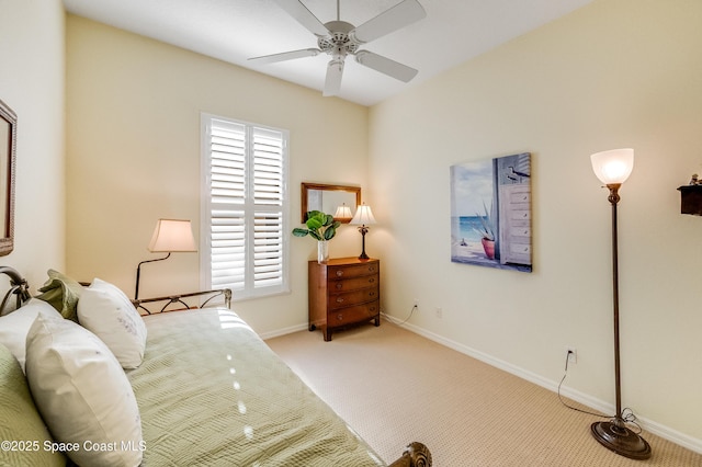 5601 Sea Lavender Pl, Melbourne Beach, FL 32951 - carpeted bedroom with multiple windows, baseboards, and ceiling fan