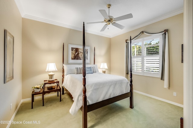 5601 Sea Lavender Pl, Melbourne Beach, FL 32951 - bedroom with ornamental molding, light carpet, baseboards, and ceiling fan