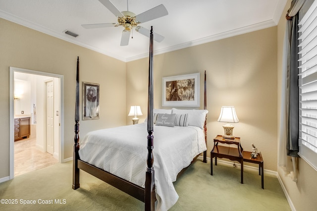 5601 Sea Lavender Pl, Melbourne Beach, FL 32951 - bedroom featuring crown molding, light carpet, baseboards, a ceiling fan, and ensuite bath