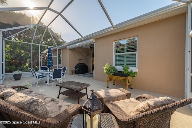 5601 Sea Lavender Pl, Melbourne Beach, FL 32951 - view of patio with outdoor dining space and a lanai