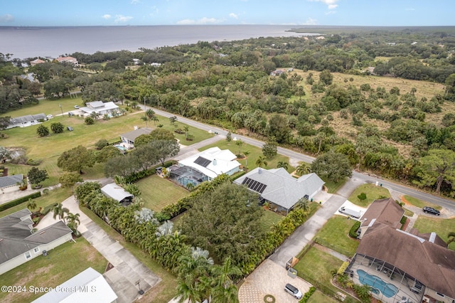 drone / aerial view with a water view