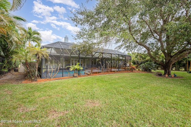 view of yard featuring a lanai