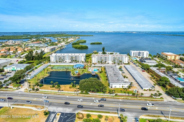 birds eye view of property featuring a water view