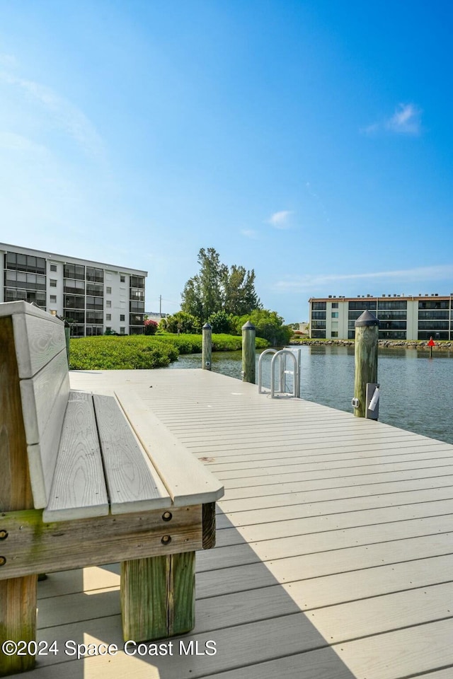 dock area featuring a water view