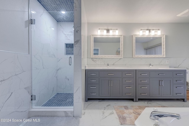 bathroom with vanity, tile walls, and independent shower and bath