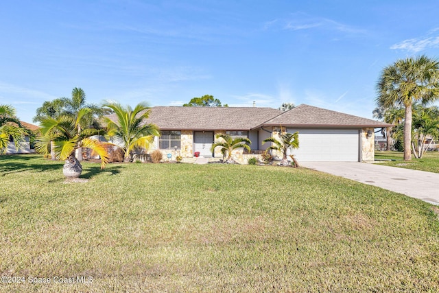 ranch-style home with a front yard and a garage