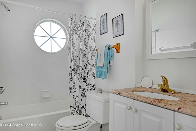 full bathroom featuring vanity, toilet, and shower / bath combo