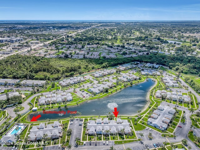 bird's eye view with a water view