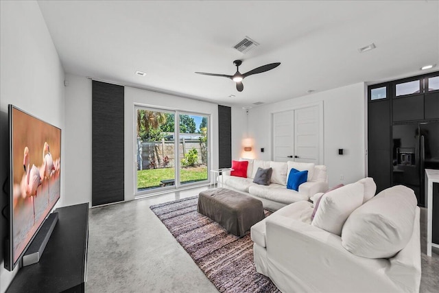 living room with ceiling fan