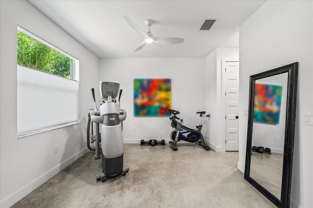 exercise room with ceiling fan