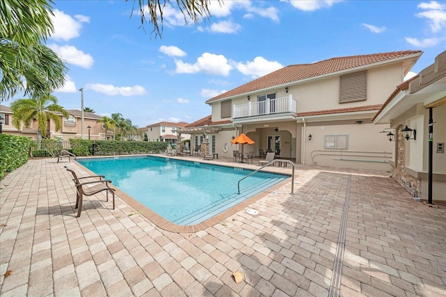 view of pool with a patio area