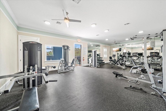 exercise room with ceiling fan, ornamental molding, and a textured ceiling