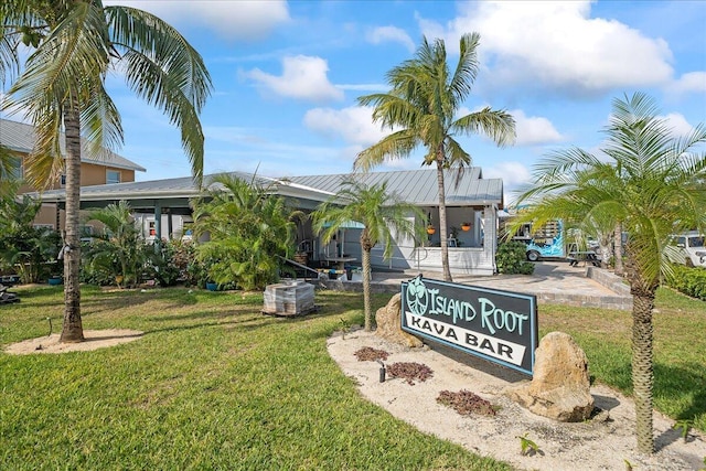 community sign with a lawn