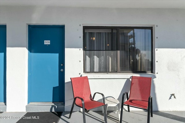 22 Tulip Ave Unit 309, Cocoa Beach, FL 32931 - view of patio / terrace