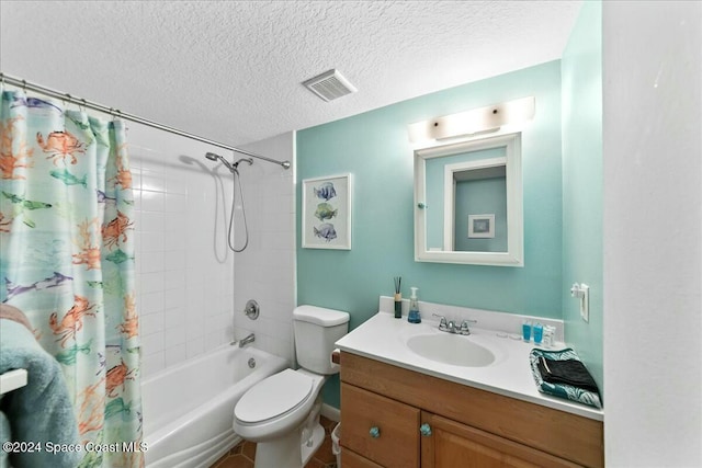 22 Tulip Ave Unit 309, Cocoa Beach, FL 32931 - bathroom with shower / bath combo, vanity, and a textured ceiling
