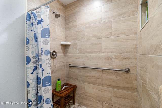 bathroom with a shower with curtain