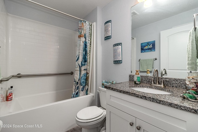 full bathroom with shower / tub combo, vanity, and toilet