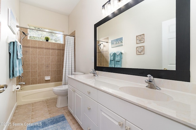 full bathroom featuring tile patterned floors, toilet, vanity, and shower / tub combo