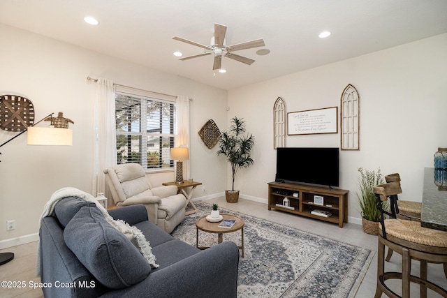 tiled living room with ceiling fan